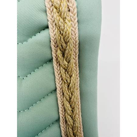 Zoom sur le liseret du tapis de dressage Softy Equithème vert clair