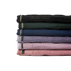 6 coloris de tapis de dressage Luxor Lamicell posés les un sur les autres