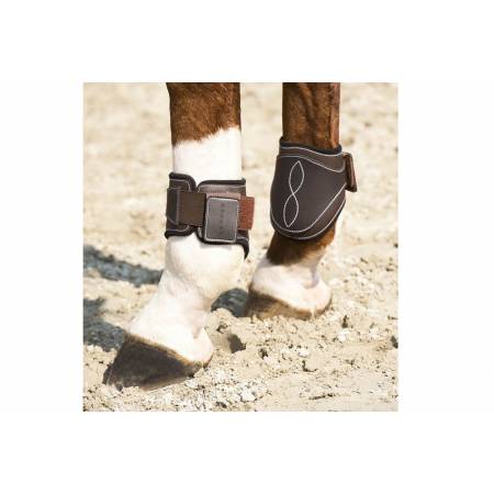 Protège boulets en cuir synthétique Eric Thomas sur un cheval